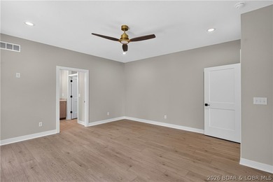 Stunning new-construction waterfront home at the Lake of the - photo 38