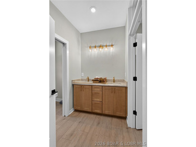 Stunning new-construction waterfront home at the Lake of the - photo 39