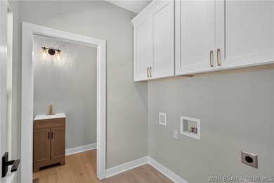 Stunning new-construction waterfront home at the Lake of the - photo 42