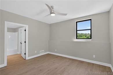 Stunning new-construction waterfront home at the Lake of the - photo 50