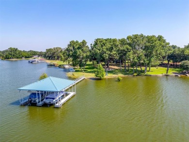 This (+-) 4.25 acre Eagle Mountain Lake estate is back and - photo 4