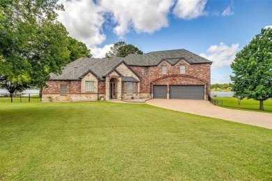 This (+-) 4.25 acre Eagle Mountain Lake estate is back and - photo 10