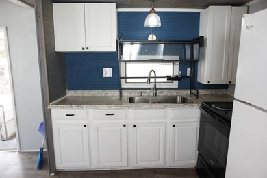 Bring your vision and make this single-wide mobile home your - photo 10