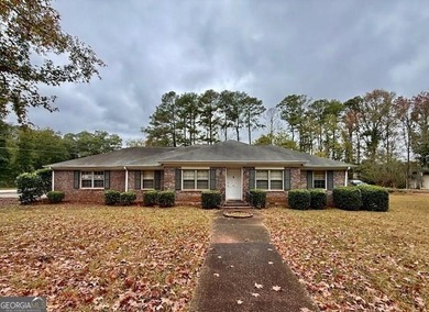 Nestled at 1840 Flat Shoals Road SE, Conyers, GA, this inviting