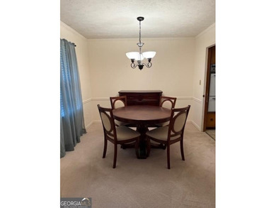 Nestled at 1840 Flat Shoals Road SE, Conyers, GA, this inviting