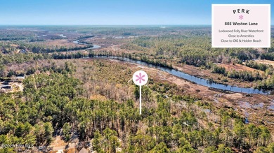Beautiful wooded riverfront homesite in RiverSea is sure to - photo 3