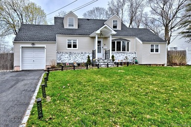 UPDATED SPACIOUS CAPE , 4 BEDROOMS 2 BATHROOMS, EAT IN KITCHEN - photo 1