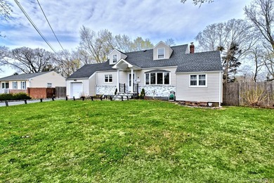 UPDATED SPACIOUS CAPE , 4 BEDROOMS 2 BATHROOMS, EAT IN KITCHEN - photo 3