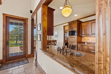 Overlooking the Eagle Bend Golf Course, this beautifully - photo 12