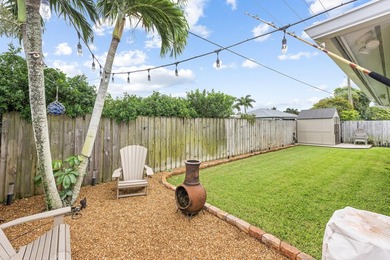 Welcome to 128 Banyan Circle, a meticulously maintained - photo 32