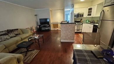 Welcome to this move-in ready brick two-family home nestled in - photo 4