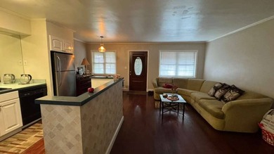 Welcome to this move-in ready brick two-family home nestled in - photo 5