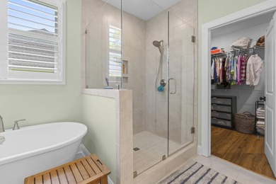 Built in 2023, this like-new home combines modern design - photo 19