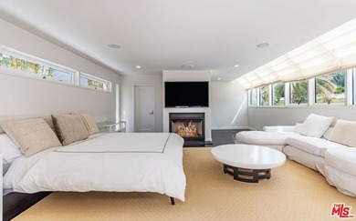 Set against the cinematic backdrop of Malibu's sparkling - photo 20