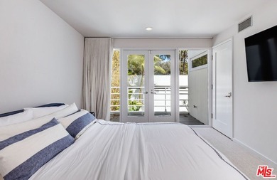 Set against the cinematic backdrop of Malibu's sparkling - photo 28
