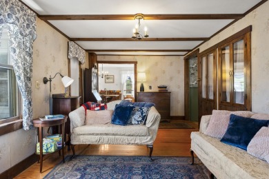Welcome to this beautifully updated New England-style home with
