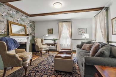 Welcome to this beautifully updated New England-style home with