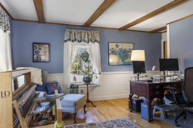 Welcome to this beautifully updated New England-style home with
