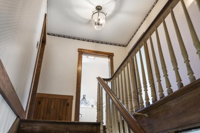 Welcome to this beautifully updated New England-style home with