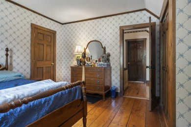 Welcome to this beautifully updated New England-style home with