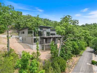 Stunning new modern home with breathtaking views located in Linn - photo 47