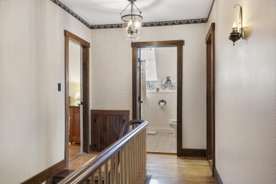 Welcome to this beautifully updated New England-style home with