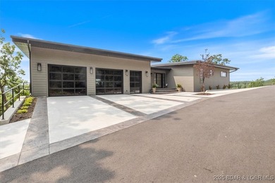 Stunning new modern home with breathtaking views located in Linn - photo 48