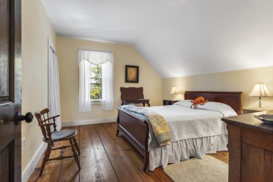 Welcome to this beautifully updated New England-style home with