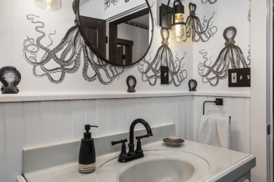 Welcome to this beautifully updated New England-style home with