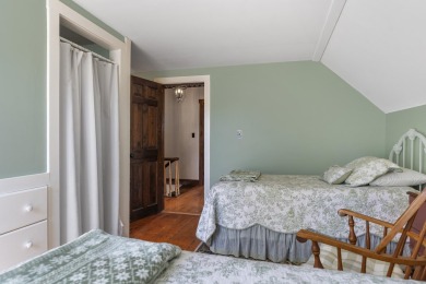 Welcome to this beautifully updated New England-style home with