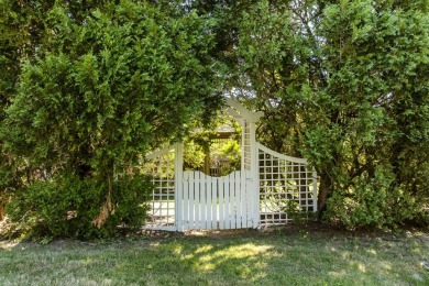 Welcome to this beautifully updated New England-style home with