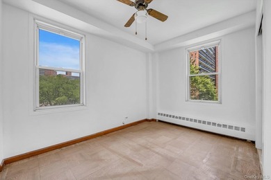 Welcome to this spacious and inviting 2-bedroom, 1-bath co-op - photo 8
