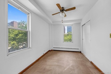 Welcome to this spacious and inviting 2-bedroom, 1-bath co-op - photo 9