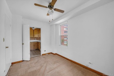 Welcome to this spacious and inviting 2-bedroom, 1-bath co-op - photo 10