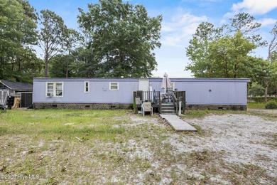 This single-wide home is a solid addition to any rental - photo 1