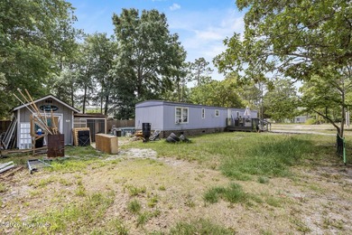 This single-wide home is a solid addition to any rental - photo 3
