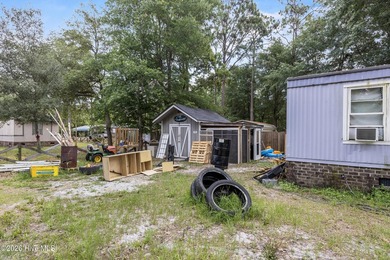 This single-wide home is a solid addition to any rental - photo 4