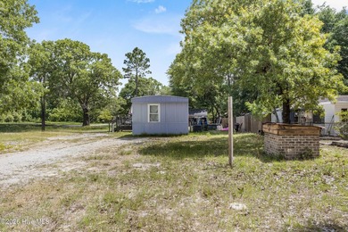 This single-wide home is a solid addition to any rental - photo 5