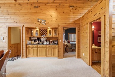 Stunning log home on the main channel of Douglas Lake! This - photo 11