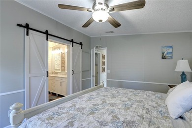 Situated on a sought-after 75' x 100' Haven Green lot, this - photo 13