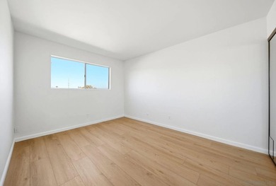 This corner-unit features views of Mount Soledad from several - photo 15