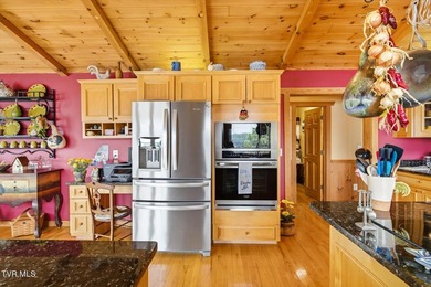 Stunning log home on the main channel of Douglas Lake! This - photo 16
