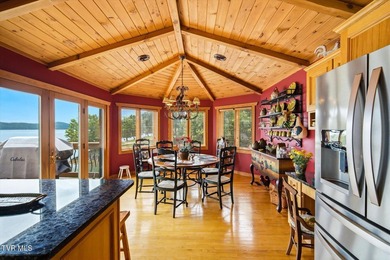 Stunning log home on the main channel of Douglas Lake! This - photo 18