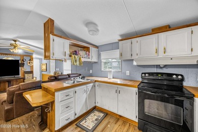 This 2 bedroom, 2 bathroom single-wide home is a strong addition - photo 3