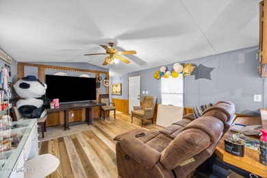 This 2 bedroom, 2 bathroom single-wide home is a strong addition - photo 5