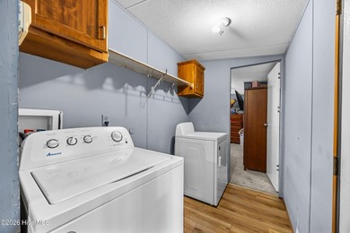 This 2 bedroom, 2 bathroom single-wide home is a strong addition - photo 6