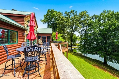 Stunning log home on the main channel of Douglas Lake! This - photo 31