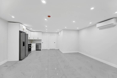 Welcome to 1359 Remsen Avenue, a stunningly renovated two-family - photo 15