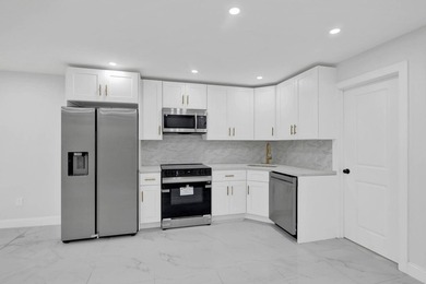 Welcome to 1359 Remsen Avenue, a stunningly renovated two-family - photo 18