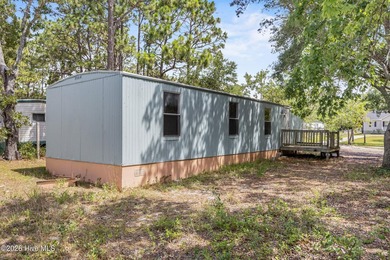 This 2-bedroom, 1-bath single-wide home offers a great - photo 2